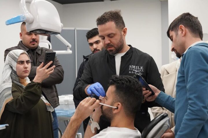 Participants observing a live clinical demonstration